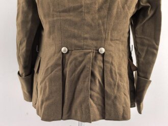 Dienstrock für Angehörige im NS Kraftfahrkorps NSKK. Das Schulterstück originalvernäht, RZM Etikett in der Tasche. Ungereinigt