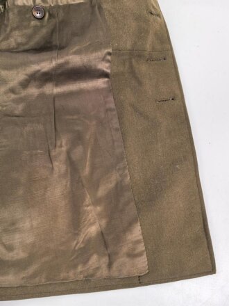 Dienstrock für Angehörige im NS Kraftfahrkorps NSKK. Das Schulterstück originalvernäht, RZM Etikett in der Tasche. Ungereinigt
