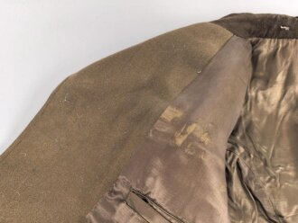 Dienstrock für Angehörige im NS Kraftfahrkorps NSKK. Das Schulterstück originalvernäht, RZM Etikett in der Tasche. Ungereinigt