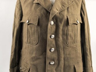 Dienstrock für Angehörige im NS Kraftfahrkorps NSKK. Das Schulterstück originalvernäht, RZM Etikett in der Tasche. Ungereinigt