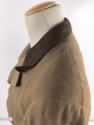 Dienstrock für Angehörige im NS Kraftfahrkorps NSKK. Das Schulterstück originalvernäht, RZM Etikett in der Tasche. Ungereinigt