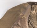 Dienstrock für Angehörige im NS Kraftfahrkorps NSKK. Das Schulterstück originalvernäht, RZM Etikett in der Tasche. Ungereinigt