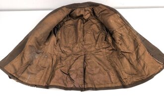 Dienstrock für Angehörige in der SA? Relativ dunkles braun, verwaschenes Etikett in der Tasche. Mottenschäden, ungereinigt