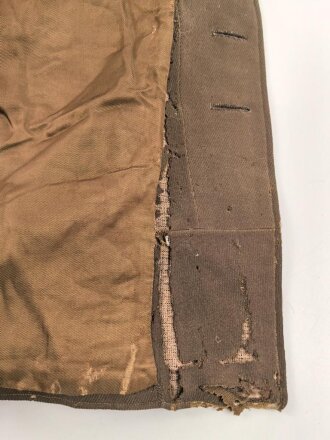Dienstrock für Angehörige in der SA? Relativ dunkles braun, verwaschenes Etikett in der Tasche. Mottenschäden, ungereinigt