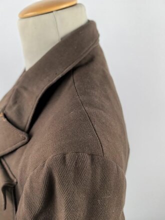Dienstrock für Angehörige in der SA? Relativ dunkles braun, verwaschenes Etikett in der Tasche. Mottenschäden, ungereinigt