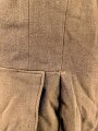 Dienstrock für Angehörige in der SA? Relativ dunkles braun, verwaschenes Etikett in der Tasche. Mottenschäden, ungereinigt