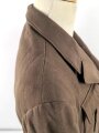 Dienstrock für Angehörige in der SA? Relativ dunkles braun, verwaschenes Etikett in der Tasche. Mottenschäden, ungereinigt