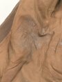Dienstrock für Angehörige in der SA? Relativ dunkles braun, verwaschenes Etikett in der Tasche. Mottenschäden, ungereinigt
