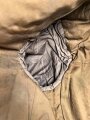 Dienstrock für Angehörige in der SA? Relativ dunkles braun, verwaschenes Etikett in der Tasche. Mottenschäden, ungereinigt