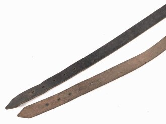 Paar Lederriemen Wehrmacht. Breite  1,7cm, Länge je 41cm, ein Stück gestempelt "Georg Paul Lederwarenfabrikation Ziegelhausen"
