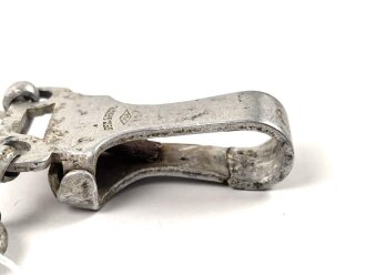 Luftwaffe "Borddolch" für Flugzeugbesatzungen. Aluminiumausführung, die Sonnenräder vergoldet. Saubere Klinge ohne Hersteller, die Scheide mit deutlichen Altersspuren.