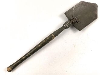 U.S. Army 1945 dated folding shovel M-1943. Uncleaned,...
