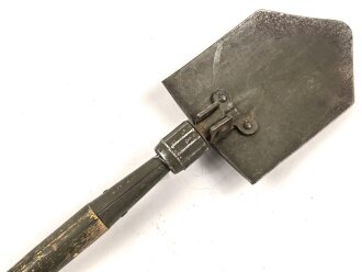 U.S. Army 1945 dated folding shovel M-1943. Uncleaned,...