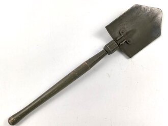 U.S. Army 1945 dated folding shovel M-1943. Uncleaned,...