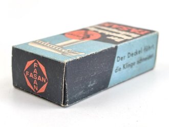 "FASAN" Rasierapparat aus weißer Preßmasse. Ungebraucht, in der originalen Umverpackung