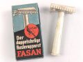 "FASAN" Rasierapparat aus weißer Preßmasse. Ungebraucht, in der originalen Umverpackung