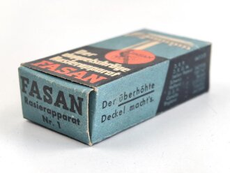 "FASAN" Rasierapparat aus weißer Preßmasse. Ungebraucht, in der originalen Umverpackung
