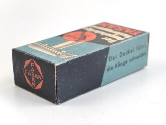 "FASAN" Rasierapparat aus weißer Preßmasse. Ungebraucht, in der originalen Umverpackung