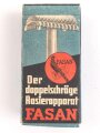 "FASAN" Rasierapparat aus weißer Preßmasse. Ungebraucht, in der originalen Umverpackung