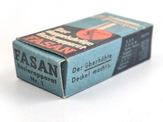 "FASAN" Rasierapparat aus weißer Preßmasse. Ungebraucht, in der originalen Umverpackung