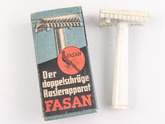 "FASAN" Rasierapparat aus weißer Preßmasse. Ungebraucht, in der originalen Umverpackung
