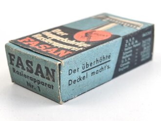 "FASAN" Rasierapparat aus weißer Preßmasse. Ungebraucht, in der originalen Umverpackung