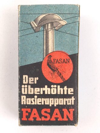 "FASAN" Rasierapparat aus weißer Preßmasse. Ungebraucht, in der originalen Umverpackung
