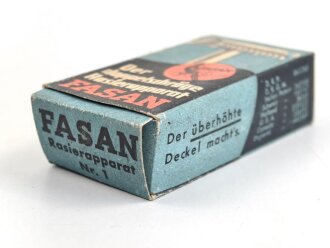 "FASAN" Rasierapparat aus weißer Preßmasse. Ungebraucht, in der originalen Umverpackung