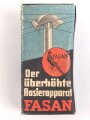 "FASAN" Rasierapparat aus weißer Preßmasse. Ungebraucht, in der originalen Umverpackung, diese leicht zerdrückt