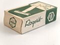 "Rogerit" Rasierapparat aus brauner Preßmasse. Ungebraucht, in der originalen Umverpackung, diese leicht zerdrückt