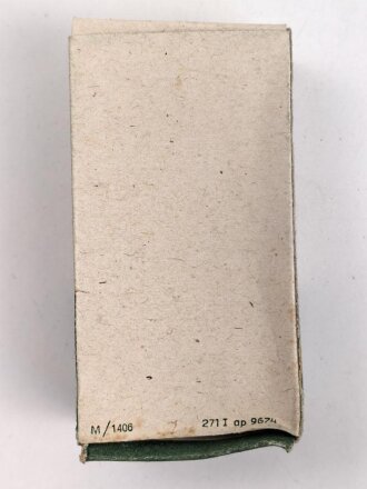 "Rogerit" Rasierapparat aus brauner Preßmasse. Ungebraucht, in der originalen Umverpackung, diese leicht zerdrückt
