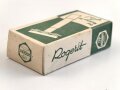 "Rogerit" Rasierapparat aus brauner Preßmasse. Ungebraucht, in der originalen Umverpackung, diese leicht zerdrückt