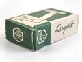 "Rogerit" Rasierapparat aus brauner Preßmasse. Ungebraucht, in der originalen Umverpackung, diese leicht zerdrückt