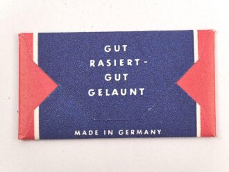 "Rogerit" Rasierapparat aus Metall. Ungebraucht, in der originalen Umverpackung, diese leicht zerdrückt