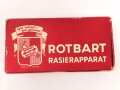 "Rogerit" Rasierapparat aus Metall. Ungebraucht, in der originalen Umverpackung, diese leicht zerdrückt