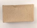 Rasierapparat aus brauner Preßmasse ohne Bezeichnung. Ungebraucht, in der originalen Umverpackung, diese leicht zerdrückt
