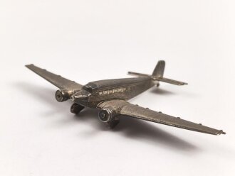 Kleines Metallflugzeug, wohl eine Junkers Ju52...