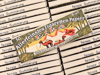 50 Blatt EFKA Zigarettenpapier, sehr guter Zustand, sie erhalten ein ( 1 ) Stück aus dem originalen Umkarton, dieser mit geschwärzter Steuerbanderole mit Hakenkreuz