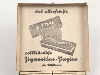 50 Blatt EFKA Zigarettenpapier, sehr guter Zustand, sie erhalten ein ( 1 ) Stück aus dem originalen Umkarton, dieser mit geschwärzter Steuerbanderole mit Hakenkreuz