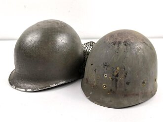 U.S. Army WWII Steel helmet.  Liner made by...