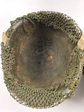 U.S. Army WWII Steel helmet.  Liner made by "Firestone"  All parts seem to have seen service after WWII as well.