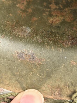 U.S. Army WWII Steel helmet.  Liner made by "Firestone"  All parts seem to have seen service after WWII as well.