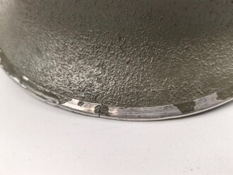 U.S. Army WWII Steel helmet.  Liner made by...