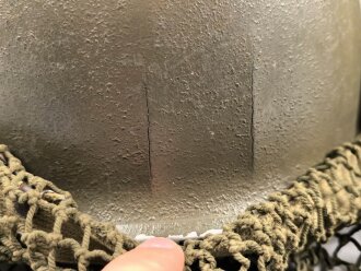 U.S. Army WWII Steel helmet.  Liner made by "Firestone"  All parts seem to have seen service after WWII as well.