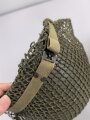 U.S. Army WWII Steel helmet.  Liner made by "Firestone"  All parts seem to have seen service after WWII as well.