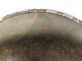 U.S. Army WWII Steel helmet.  Liner made by "Firestone"  All parts seem to have seen service after WWII as well.