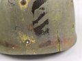 U.S. Army WWII Steel helmet.  Liner made by "Firestone"  All parts seem to have seen service after WWII as well.