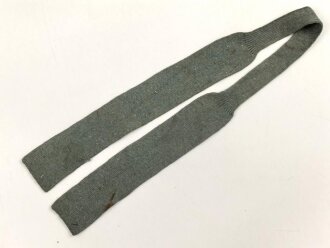 Gestrickter Ohrenschützer ?  Gesamtlänge etwa 90cm