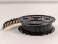 16mm Film auf AGFA Spule. Auf den ersten Metern ist ein schliessendes Flakgeschütz zu erkennen