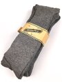 Sechs Paar graue Wollsocken aus der Zeit des 2. Weltkrieg. Ungebraucht, in der originalen Papierbanderole, diese leicht beschädigt